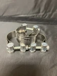 Helix Racing 212-2757 Exhaust Clamp; 1.56 To 1.70 Inch Diameter; Band Sta. Fixed Price $30.59.