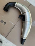 2002-05 Polaris Rmk, Switchback Exhaust Expansion Pipe 1261152, 1261151-029. Fixed Price $125.00.