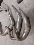 88 95 Polaris Indy 650/ Rxl Wedge Triple Pipe Exhaust Aftermarket. Fixed Price $550.00.